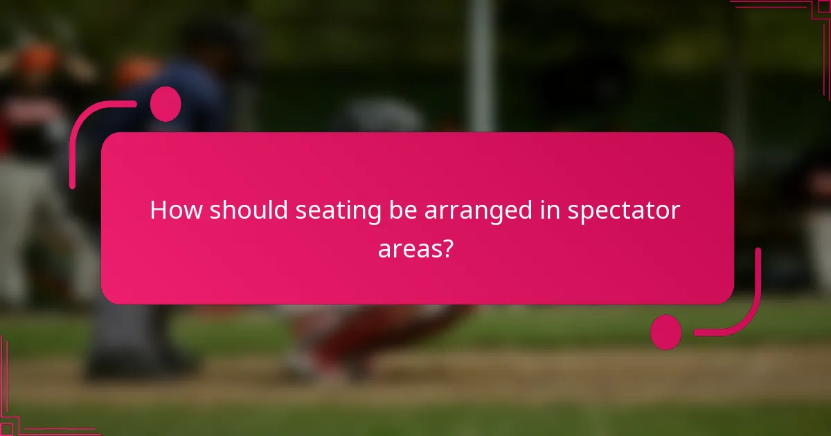 How should seating be arranged in spectator areas?